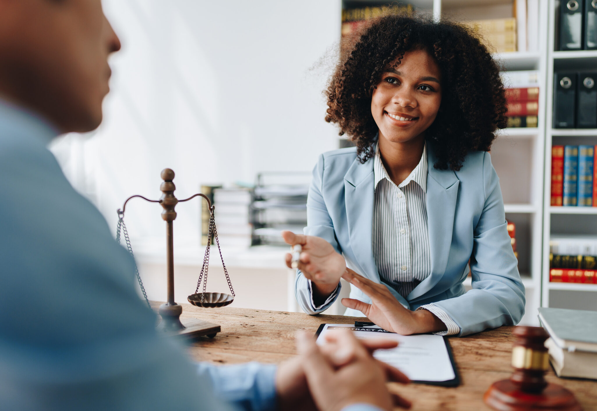 african american attorney, lawyers discussing contract or business agreement at law firm office, Business people making deal document legal, justice advice service concepts.