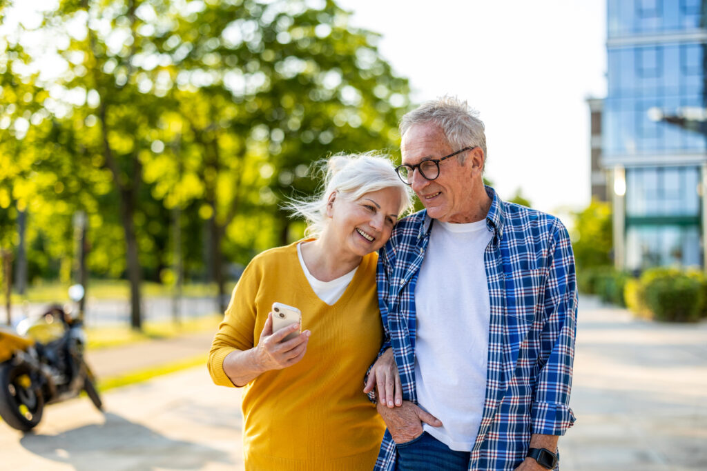 Senior couple in love walking in the city retire elderly couple